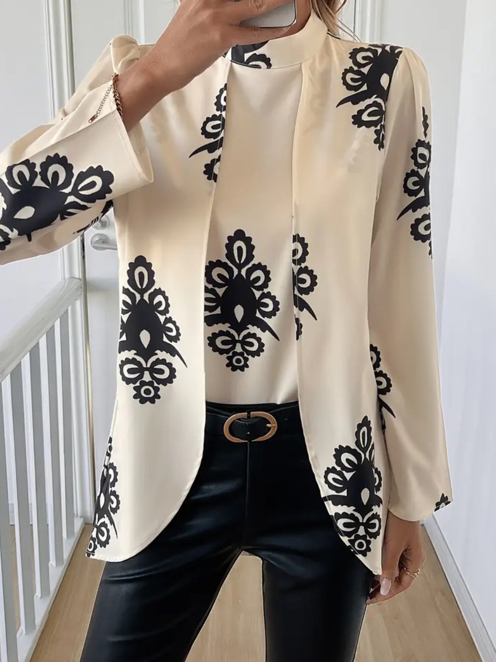 Elegant Cream and Black Floral Long-Sleeve Blouse